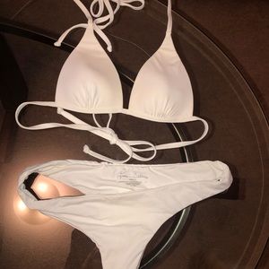 Frankie’s Bikinis size small top and medium bottom